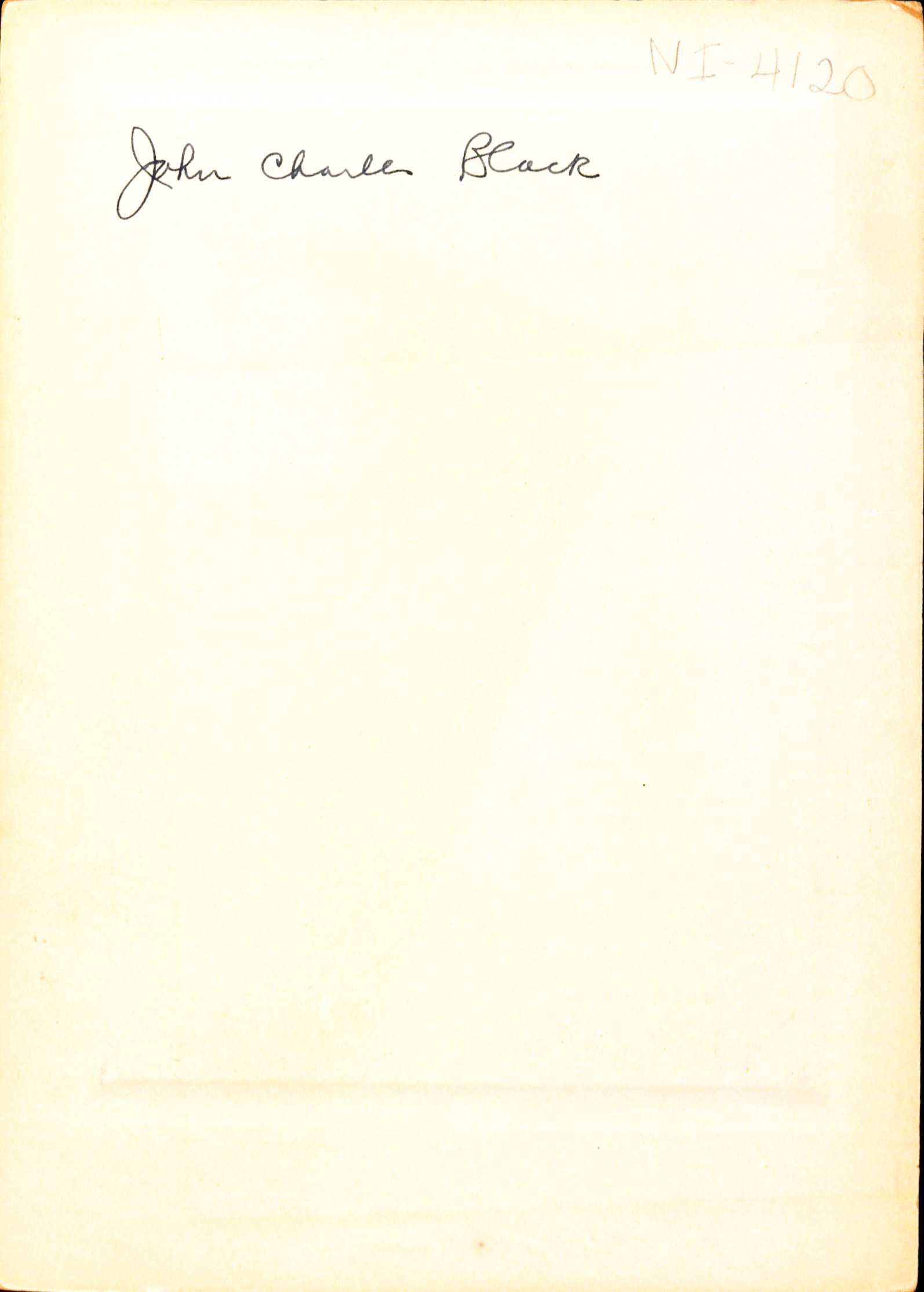 Back of a photo with the words John Charles Black