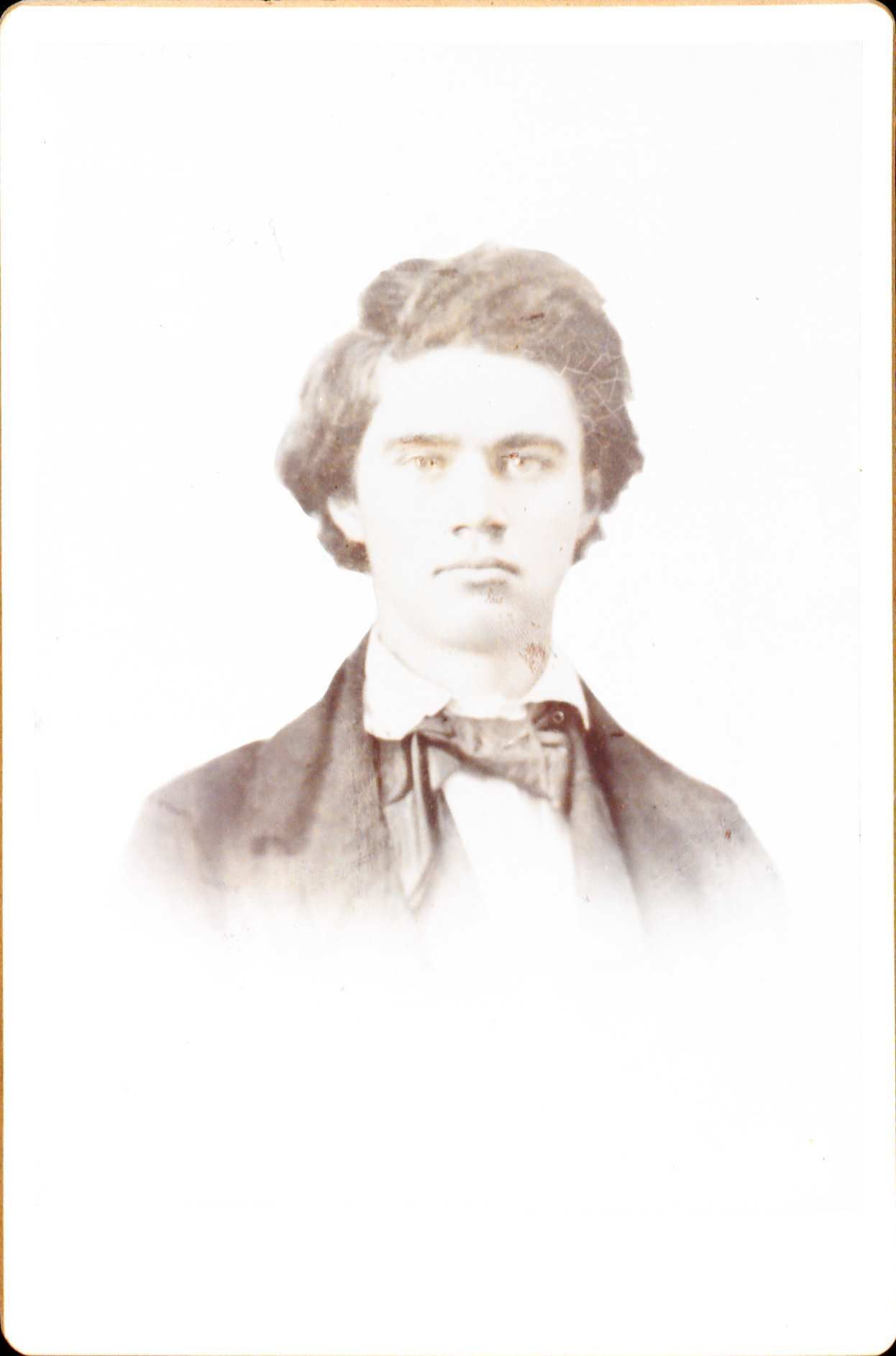 Portrait of a young John Black he is looking straight ahead