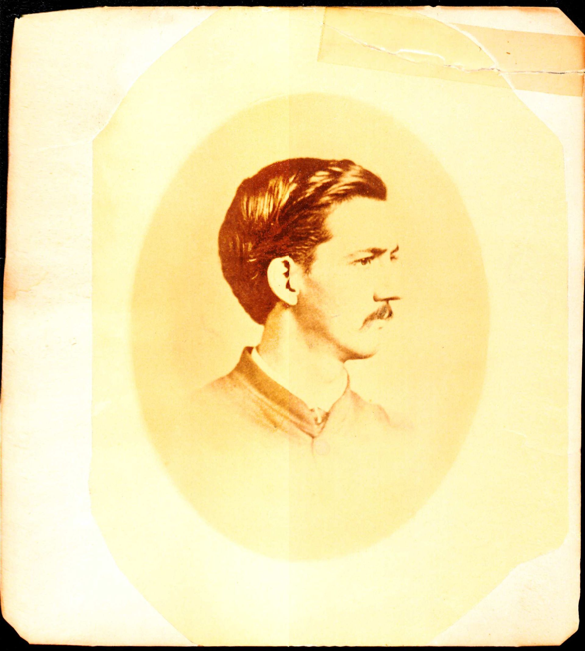 Portrait of William Black looking off to the right. he has dark hair and a moustache