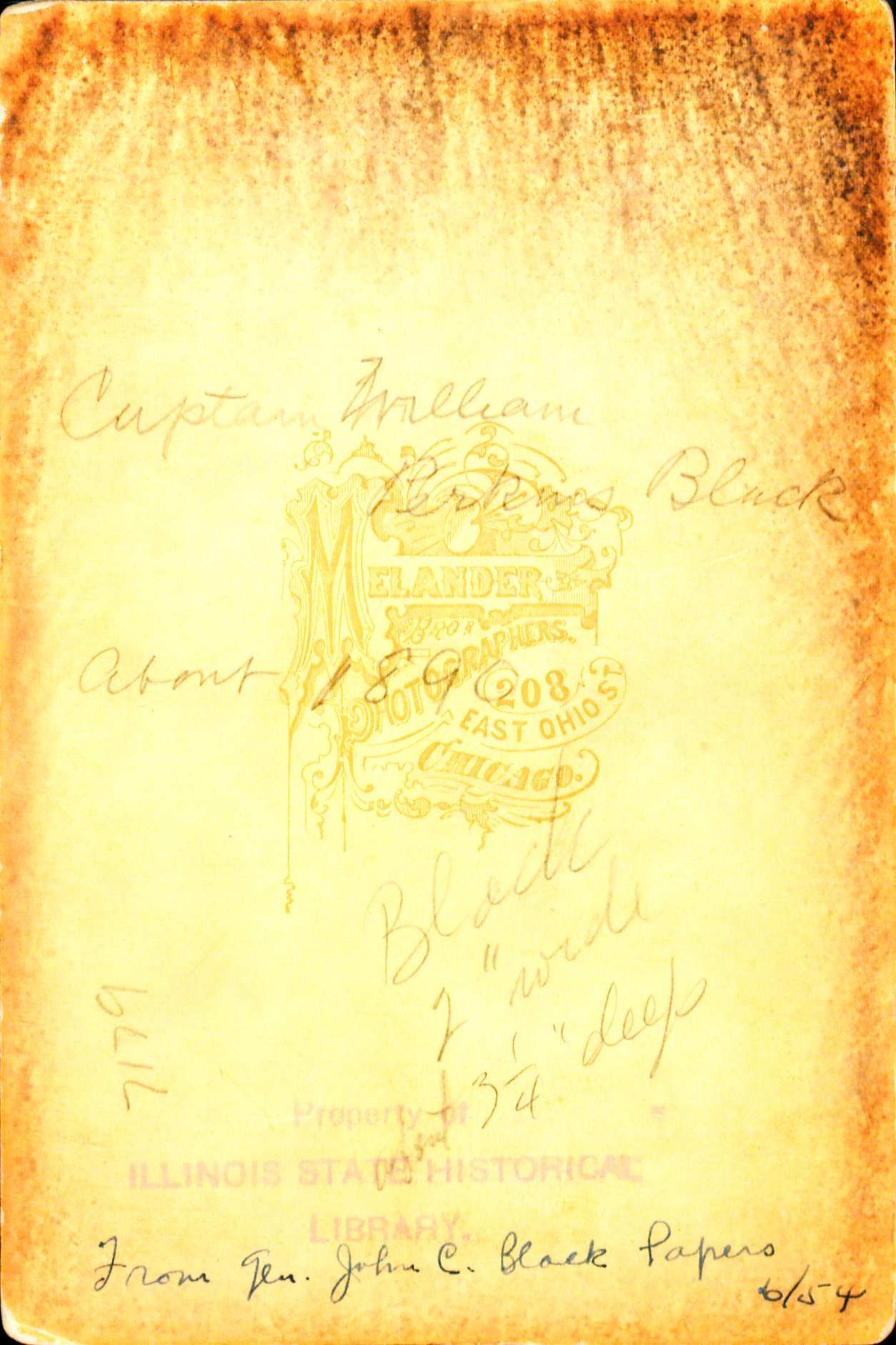 Back of a photo with the words Captain William Perkins Black  written in cursive
