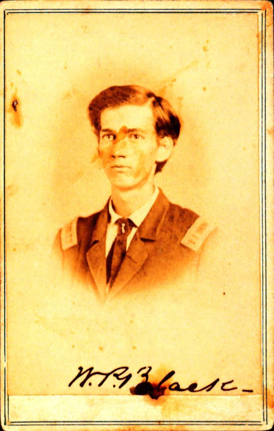 Portrait ofa  younger William Black looking off to the left. He is wearing a shirt, tie and a jacket with two patches on the shoulders