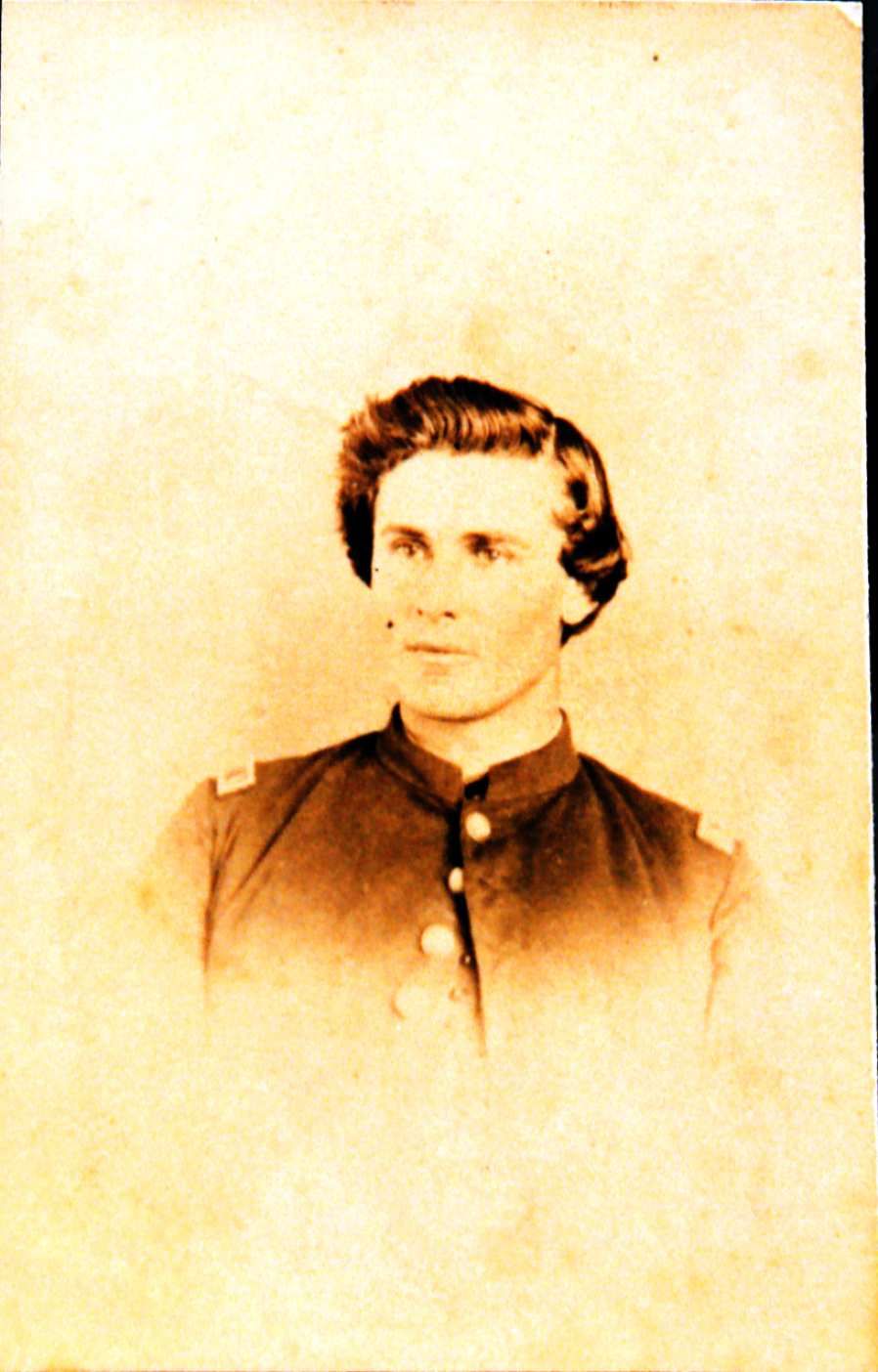 Portrait of a young William Black. He is wearing a military uniform. and is looking off to the left